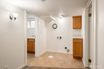 The dedicated laundry space is right off of the kitchen.