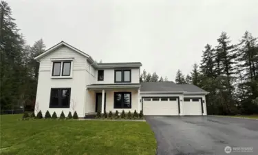 FRONT VIEW OF HOUSE  LANDSCAPED & SPRINKLER SYSTEM