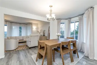 Dining room windows overlook the big side yard