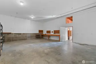 30 Feet deep by 24 feet wide.  11ft garage door