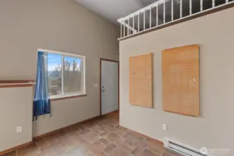 2nd room in apartment area. With accessible loft with power & light. Access to side yard