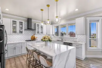 Completely remodeled with brand new kitchen cabinets, quartz counters, waterfall island, new light fixtures...