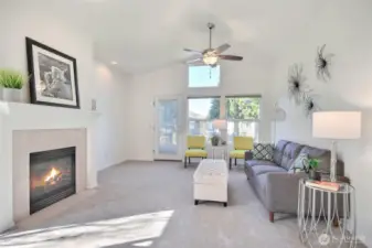 Vaulted ceilings add to the spaciousness of this living area. Plenty of room for all your furniture. In the dining room as well