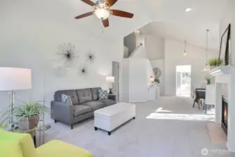 Such a great living room! The door on the left leads to the primary bedroom. The door straight ahead leads to the kitchen.