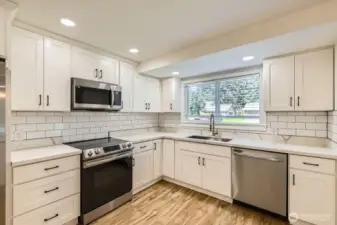 New quartz counter tops- self-closing cabinets