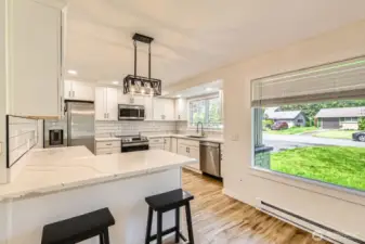 A view from the living room to the kitchen-cozy!