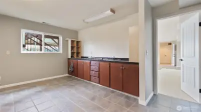 Lower floor den or office with built-ins and even a lake view