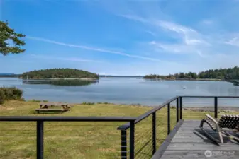 The views of the deck showcase marine life, even the occasional orcas and humpback whales, and island views. Straight ahead is Turn Island, with Lopez Island just beyond.