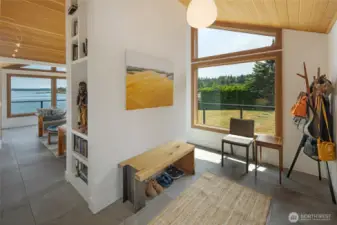 The bright entrance to the main house, leading straight to the sunroom.