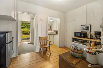The entrance and rustic kitchen in the farmhouse.