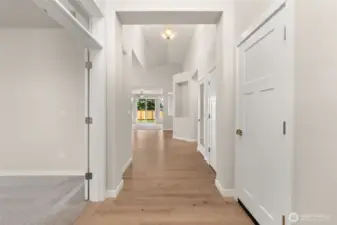Welcome home! Step into the entry hall with hardwood flooring, contemporary details and white millwork throughout.