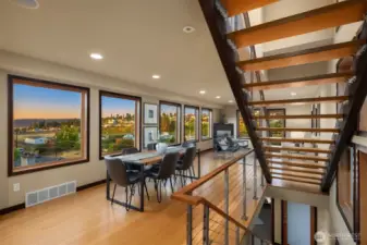 Dining Room with big windows to capture the luscious views.