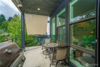 Covered deck for added entertaining or morning coffee.