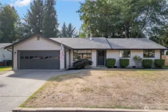 Beautiful updated rambler backed up to the Capitol City Golf Course on a 8,300 SF lot