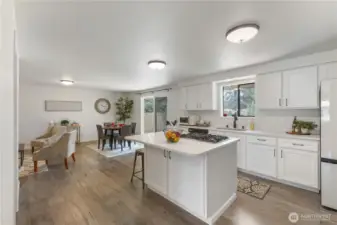 Open plan with remodeled kitchen with eating space