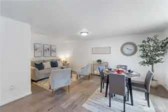Eating space & family room area off of the kitchen.  Slider opens to fully fenced backyard with deck and firepit