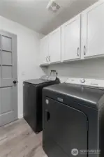Laundry room located off the kitchen