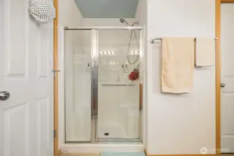 There is an oversized shower in the primary bathroom.