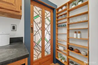 This house is filled with special touches like this stained glass bathroom door.
