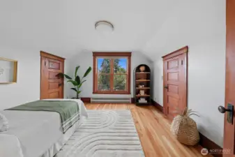 First of two big bedrooms upstairs, each with two closets. Rainier views from this bedroom!