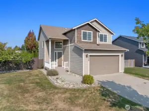 This home is sited on a gorgeous well manicured corner home site.