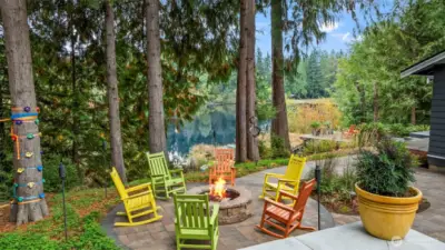 After a day on the lake, the perfect way to end the evening is warming up by a bonfire with both nature and good company surrounding you. This home truly hits all of the checkmarks for entertaining.