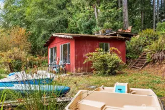 The waterfront includes this original 20 x 12 boathouse which is now grandfathered in.  It's a huge asset to the property because there is zero chance you could ever build this close to the shoreline again.  Possibilities are endless - bring your ideas!