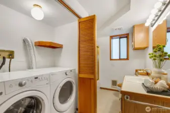 Lower level bathroom and laundry.