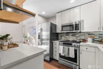 Looking from one entrance of the kitchen to the dining room