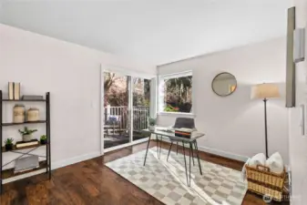 The great room, with access via the sliding glass door to your personal, fenced-in patio.