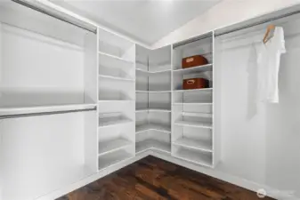 Large, walk-in primary bedroom closet comes with lovely built-ins; no matter your wardrobe, it will all fit!