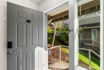 The entry is split, with the option of going downstairs to the garage or upstairs to the main floor.