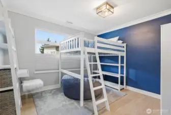 Bedroom on the main level, with ensuite bathroom