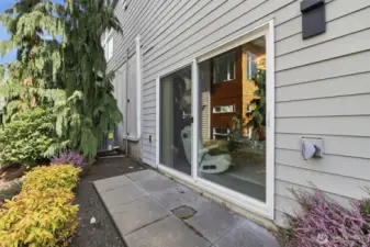 Bonus room opens to a back patio