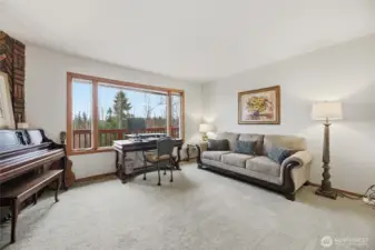 Another living space which is used as an office and music room.