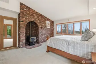 A cozy fireplace area in the Primary Suite.