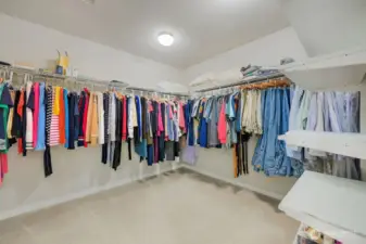 Primary bedroom walki-in closet