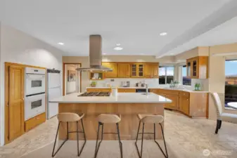 Kitchen with island bar seating.