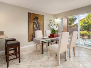 The open and light-filled dining room is the perfect size for a condo.