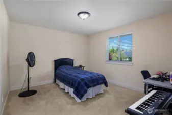 Guest bedroom #2 with walk-in closet.