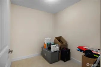 Upstairs is an oversized storage room/closet.