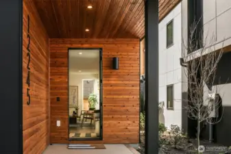 Tongue and Groove Covered Entry with Poured Concrete Porch