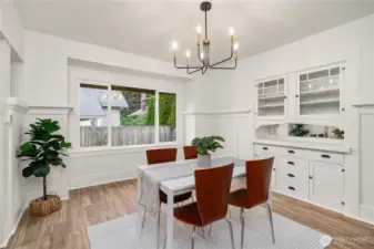 Dining room with built-ins and wainscoting