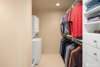 Closet features washer and dryer, for ultimate convenience.