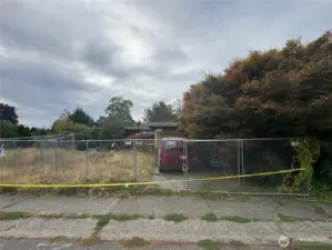 Opportunity awaits in the sought-after Fairwood Greens neighborhood! This spacious lot offers a rare chance to create your dream home in a well-established neighborhood surrounded by mature trees and quality homes. The previous residence was lost to fire, leaving remnants of the original structure — ideal for buyers or builders ready to reimagine the space from the ground up. Utilities are already on-site, simplifying the rebuild process. Enjoy a peaceful, suburban setting with nearby parks, schools, shopping, and convenient commuter access. Whether you’re an investor or a homeowner with a vision, this property is your blank canvas to bring new life to a desirable Renton location.