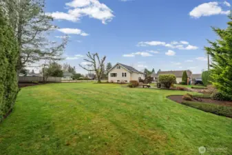 Double lot is fully fenced and there is an additional sewer hookup to add another house or ADU!