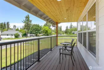 The property boasts a very spacious and inviting front porch, providing an excellent area for relaxation and enjoying outdoor living.
