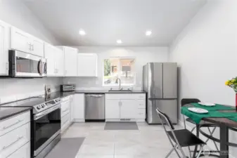 The kitchen window offers seamless connection between interior and outdoor spaces, making it special and desirable.