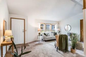 Gather for a relaxing evening in the vaulted living room.