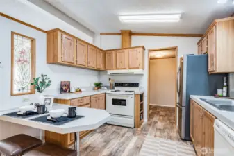 The large kitchen has handy breakfast bar!